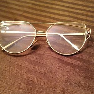 Gold cat shaped glasses